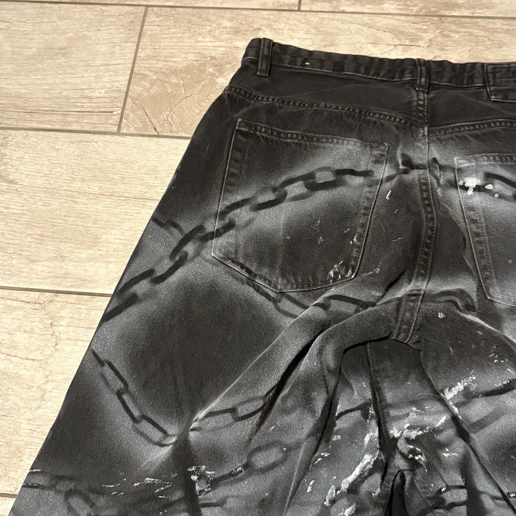 Czarne, szerokie jeansy punkowe: Gotycki styl Y2K, alternatywna odzież uliczna, ręcznie robione